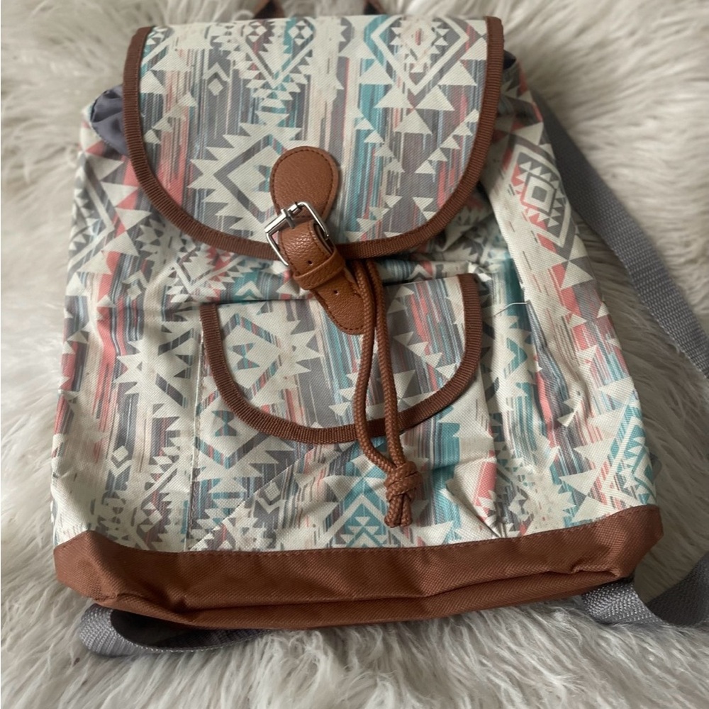 Geometric Patterned Backpack With Brown Accents - image 2